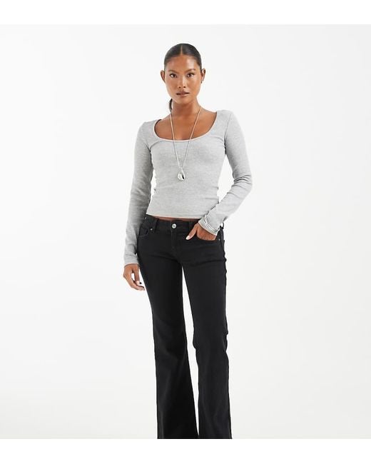 Only Petite White Lola Super Low Waist Flared Jeans