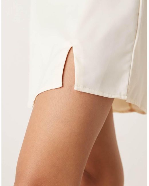 NARRATED Natural Side Split Mini Skirt