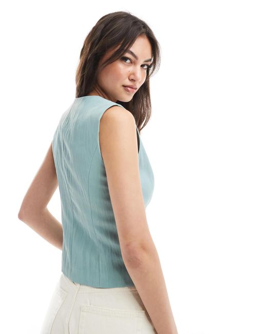 Stradivarius Blue – asymmetrische weste