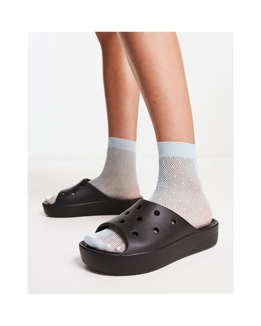 Sandalias negras sin cierres plataforma de Crocs™ de color Blanco | Lyst