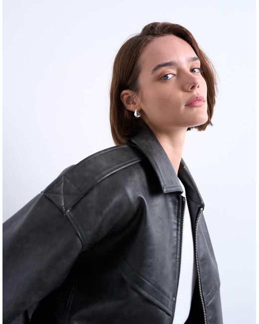 Chaqueta Bomber Negra Extragrande Con Lavado Envejecido, Cremallera Y Detalle De Costuras De Cuero Sintético De -Negro TOPSHOP de color Black