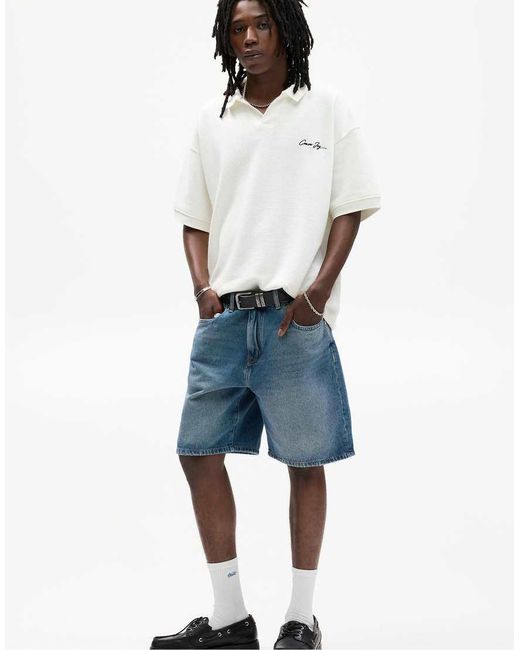 Pull&Bear Blue Knit Polo Shirt With Embroidered Slogan for men