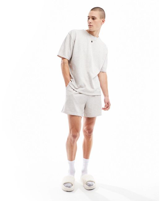 ASOS – lounge-set aus t-shirt und shorts in White für Herren