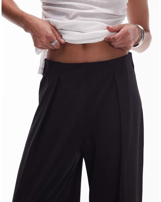 Pantalones Negros Elásticos De Pernera Ancha Con Cinturilla Elástica De Mango de color Black
