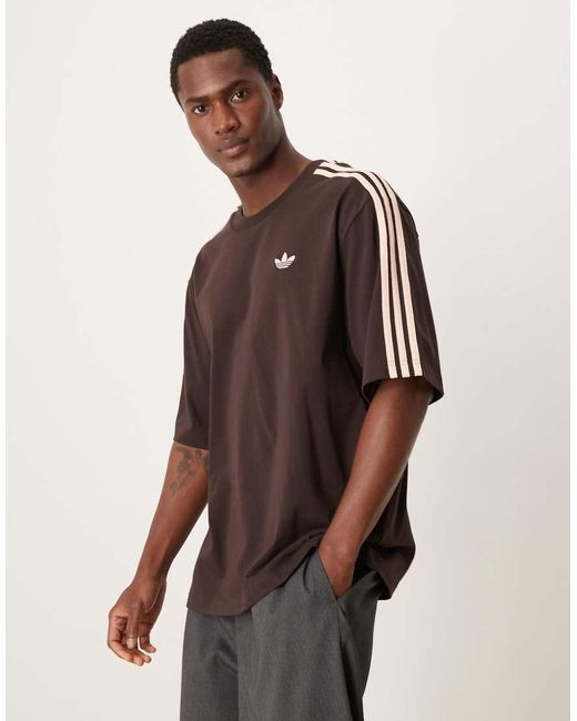 Adidas Originals Brown Three Stripe Oversized T-Shirt for men