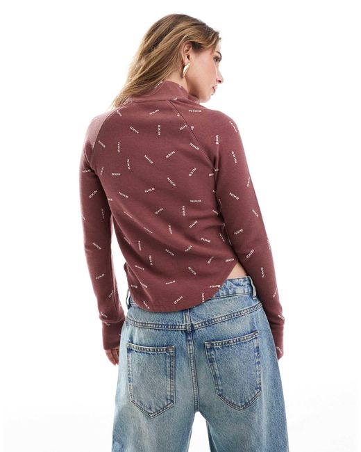 Top à manches longues et col zippé avec logo virgule - bordeaux Nike en coloris Red