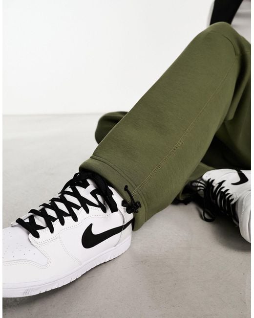 Nike Green Tech Fleece Loose Fit joggers With toggle for men