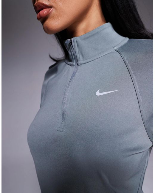 Tempo - t-shirt à col zippé et manches longues en tissu dri-fit Nike en coloris Blue