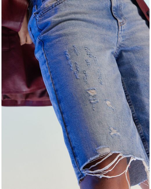 Pantalones cortos vaqueros rasgados ASOS de color Blue