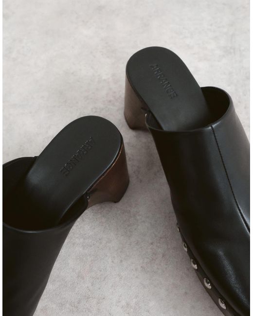 ARRANGE White Leather Studded Clogs
