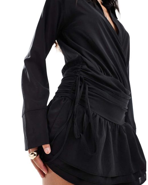 Kaiia Black Exclusive Plunge Neck Dropped Waist Ruffle Hem Mini Dress