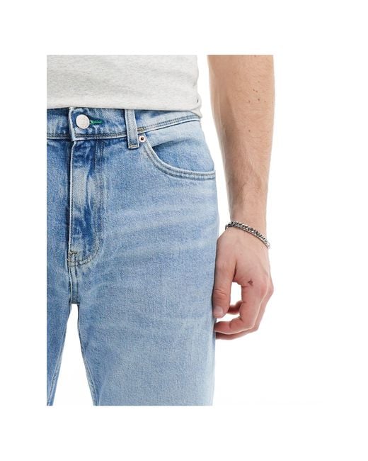 Ethan - jeans dritti comodi lavaggio chiaro di Tommy Hilfiger in Blue da Uomo
