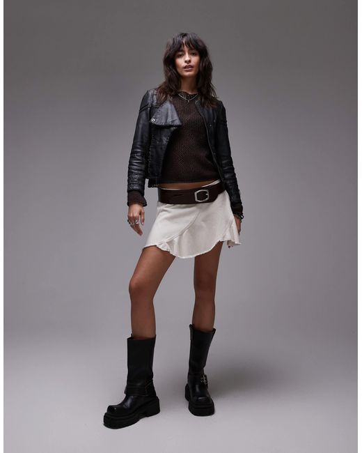 Mini-jupe taille basse avec détails circulaires - beige clair Monki en coloris White