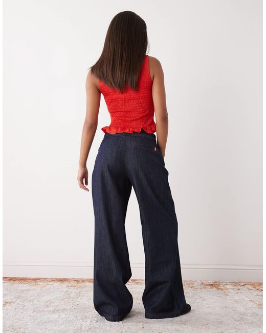 Jean ample en chambray - brut délavé Collusion en coloris Blue