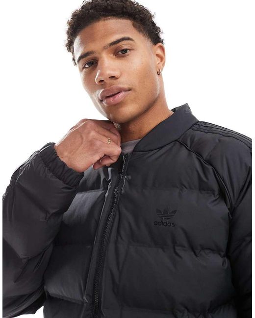 Black superstar jacket on sale