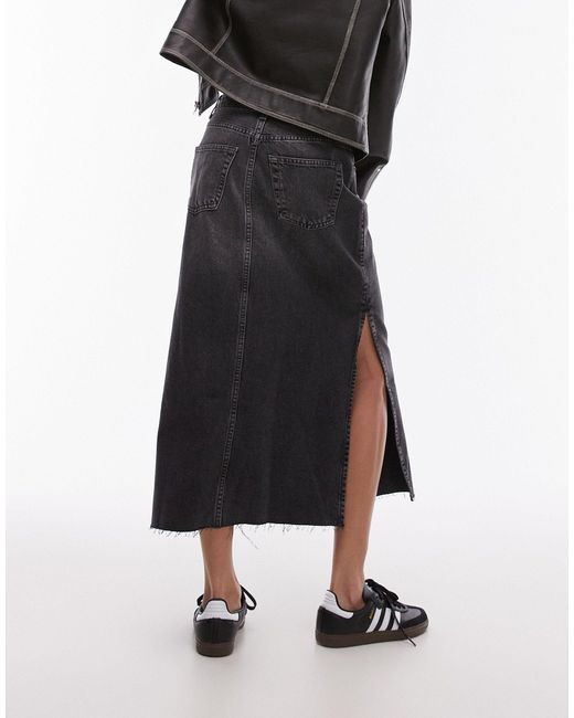 Asos design - jupe mi-longue en jean fendue sur le côté - délavé TOPSHOP en coloris Black