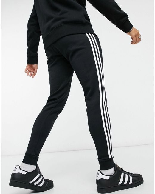 adidas Originals Adicolor Three Stripe Skinny Track Pants in Black for Men  | Lyst
