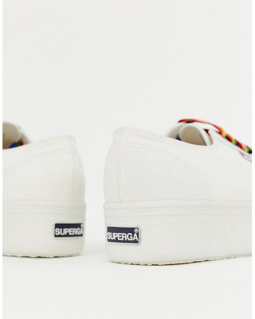 all white timberlands with rainbow laces