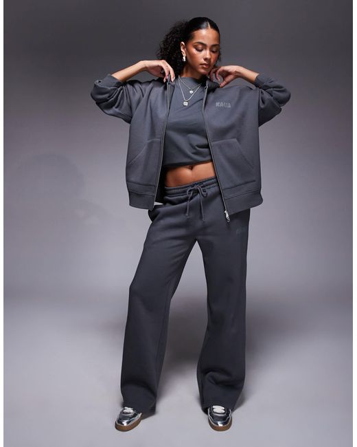 Sweat à capuche d'ensemble zippé en coton majoritaire à logo orné Kaiia en coloris Blue