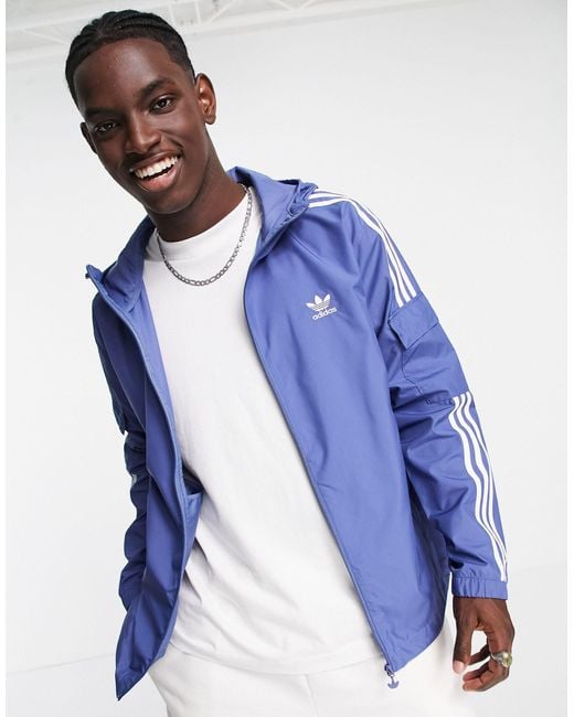 adidas Originals Adicolor Three Stripe Windbreaker Jacket in Blue for Men |  Lyst UK