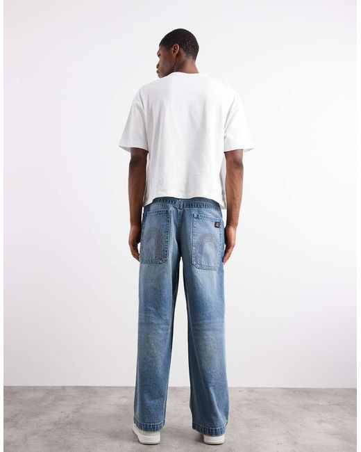 ASOS Natural Loose Fit Jeans With Embroidered Back Pocket for men
