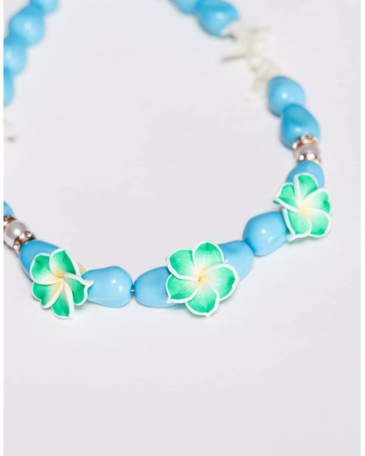 Collana Con Perline Spesse E Fiori Di Loto di South Beach in Purple