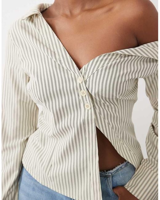 The Frolic White Exclusive Asymmetric Off Shoulder Detail Split Front Flare Sleeve Shirt