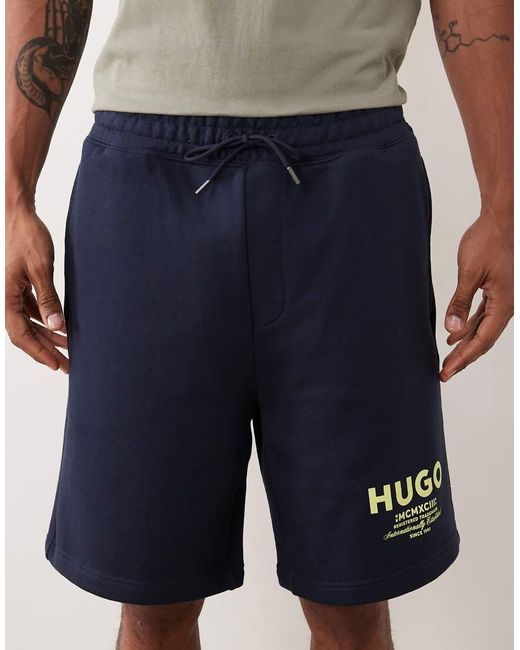 HUGO Natural Loose Fit Shorts With Logo Print for men