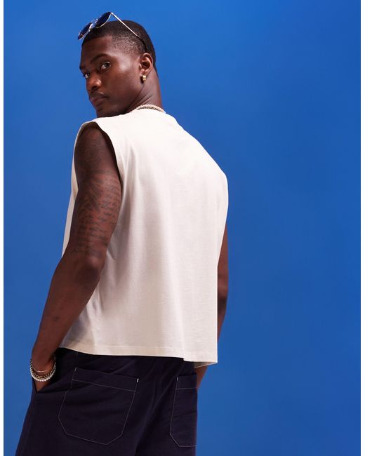 Camiseta corta extragrande sin mangas con estampado ASOS de hombre de color Blue