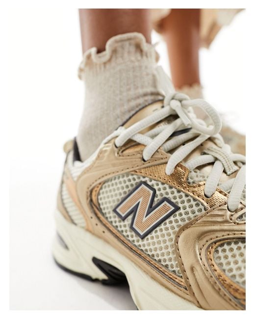 530 - sneakers metallizzate bronzo di New Balance in Natural
