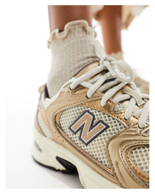 530 - sneakers metallizzate bronzo di New Balance in Natural