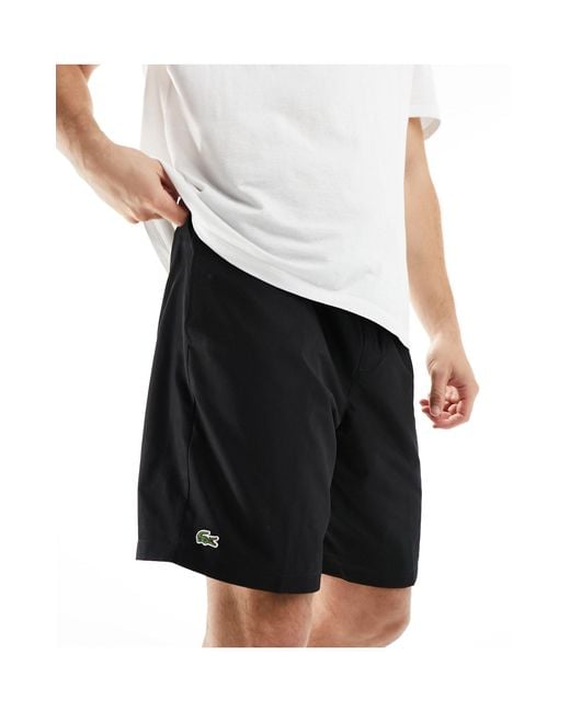 Lacoste – sportliche jersey-shorts in Black für Herren