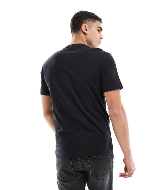 Jeans - t-shirt nera con logo sfumato di Calvin Klein in Black da Uomo