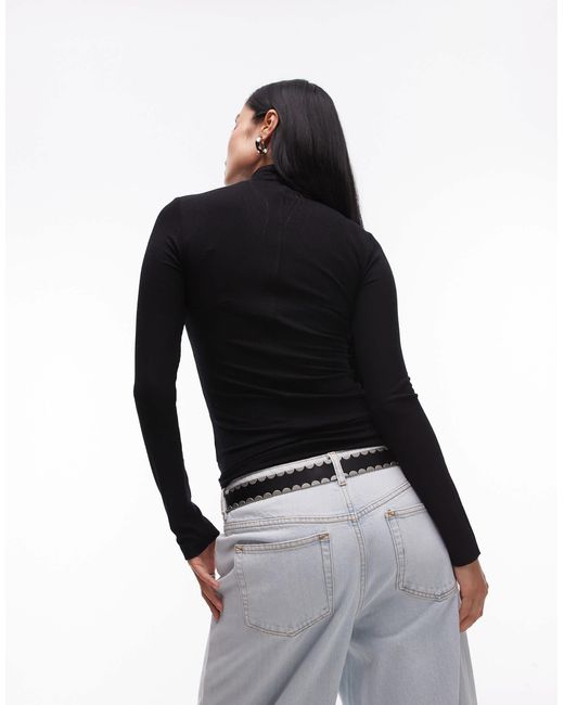 Top côtelé à manches longues et col cheminée TOPSHOP en coloris Black