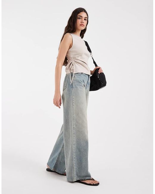 Levi's Alila Asymmetrische Jersey Top Met Strik in het Gray