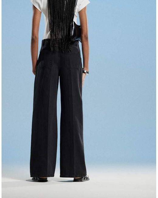 Vaqueros Negros De Pernera Ancha Con Botones Dorados Emma De Mango de color Blue