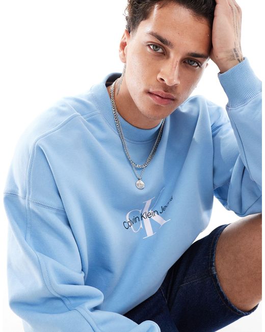 Sudadera azul con cuello redondo y logo Calvin Klein de hombre de color Blue