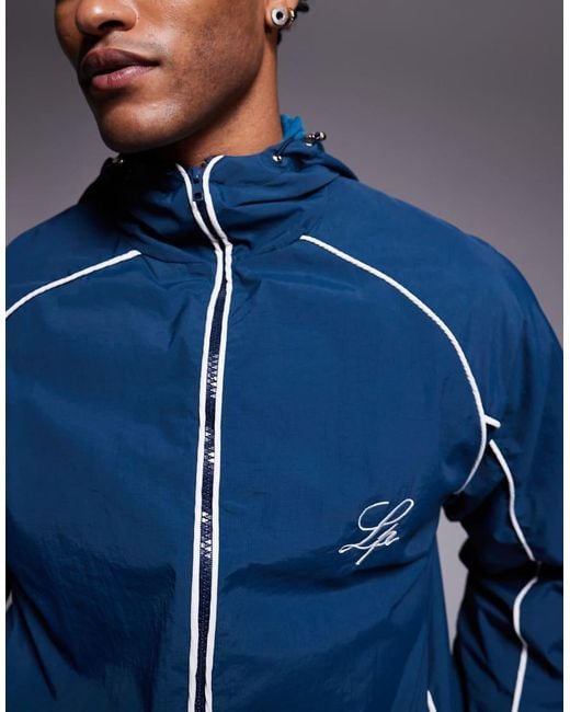 Liquor N Poker Blue Nylon Track Jacket With Logo And Piping Details for men