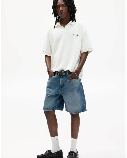 Polo en maille à slogan brodé - cassé Pull&Bear pour homme en coloris Blue