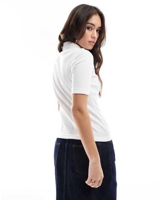 Fred Perry Ribbed Polo Shirt in White | Lyst UK