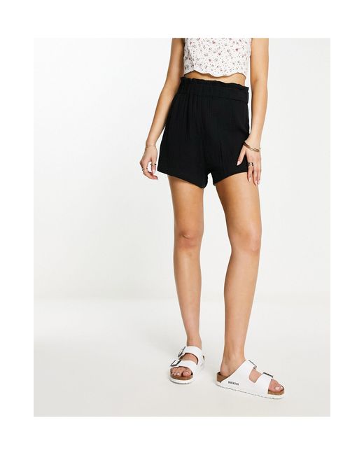 Monki High Waisted Pull On Shorts in Black | Lyst