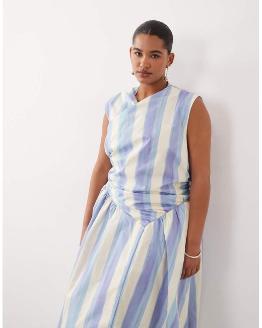 ARRANGE Blue Curve Wrap Drop Waist Maxi Dress