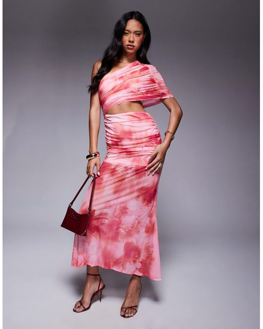 Robe longue et asymétrique à imprimé fleuri avec jupe transparente et corsage froncé - rose ASOS en coloris Pink