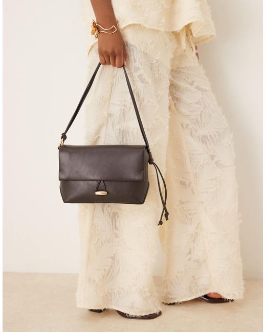 Sac à main élégant avec fermoir doré Mango en coloris Black