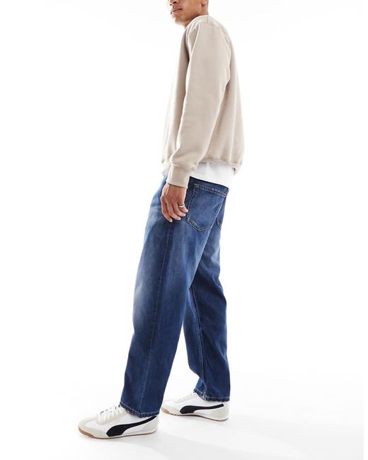 Calvin Klein Blue 90's Tapered Jeans for men