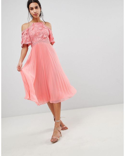 lace evening dress with pleated skirt