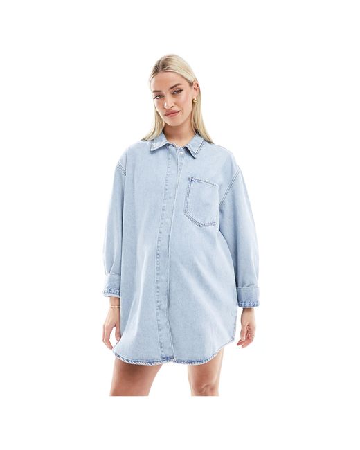 Asos design maternity - robe chemise courte en jean avec poche devant - délavage ASOS en coloris Blue