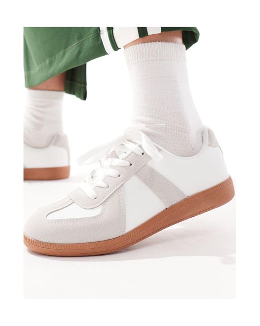 Sneakers bianche con suola di Truffle Collection in White