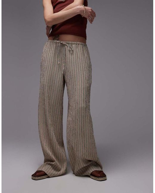 Pantaloni A Vita Bassa Con Fondo Ampio Allacciati di TOPSHOP in Brown