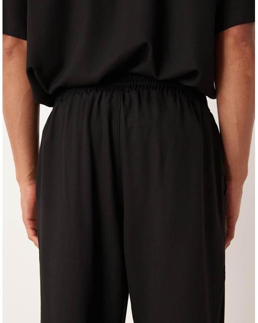 Pantaloni Affusolati Neri di ASOS in Black da Uomo